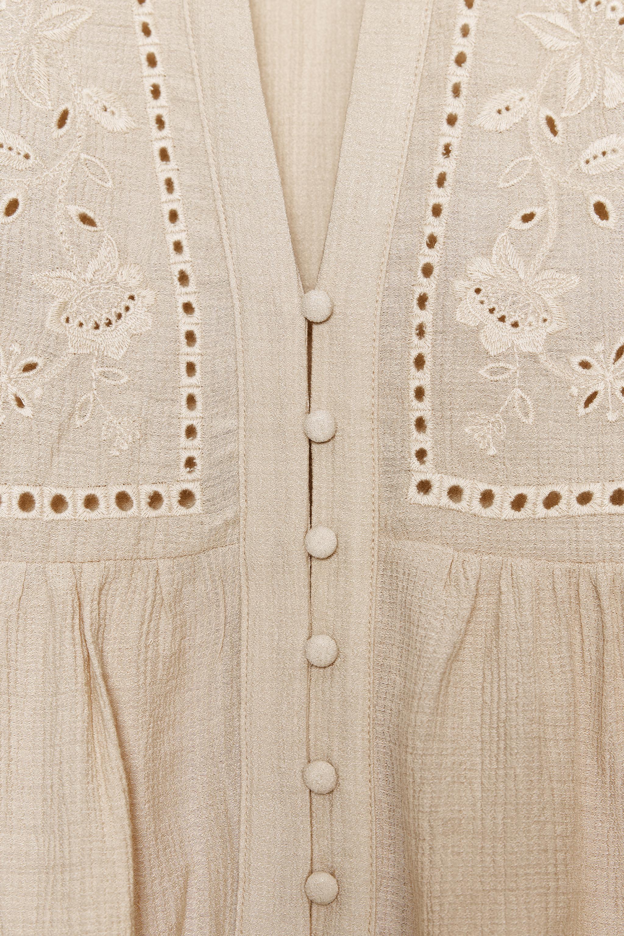 SHORT EMBROIDERED EYELET BLOUSE